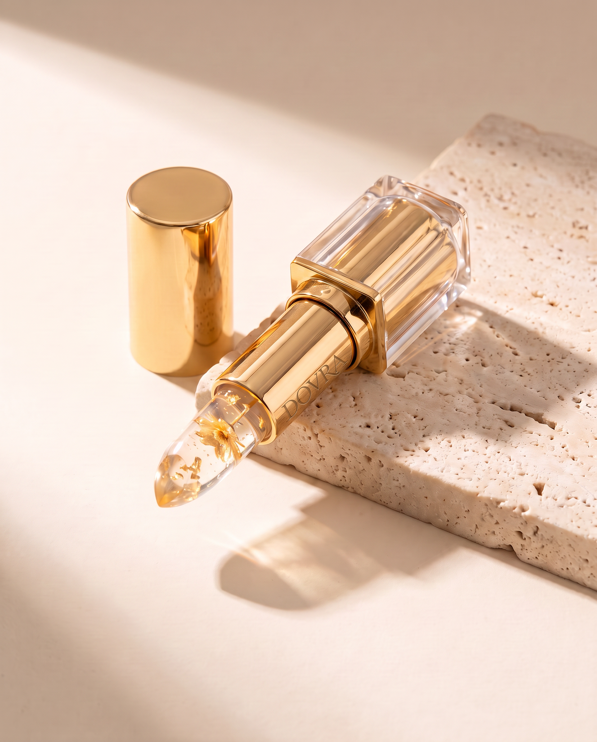 Dovra gold lipstick on ivory